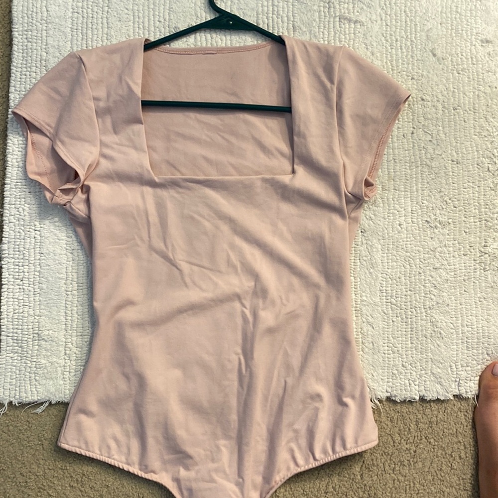 Pink bodysuit